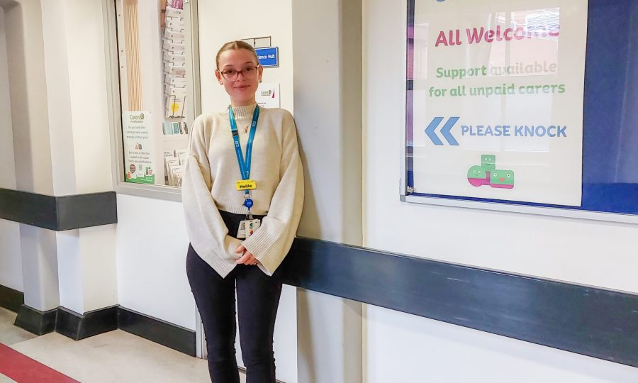 Support Worker at Bedford Hospital Carers Hub A Support worker standing outside Carers Hub at Bedford Hospital